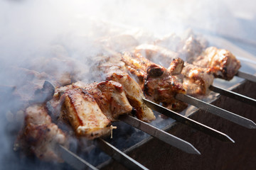 pieces of pork meat on the rib grilled, concept, camping and cooking, selective focus