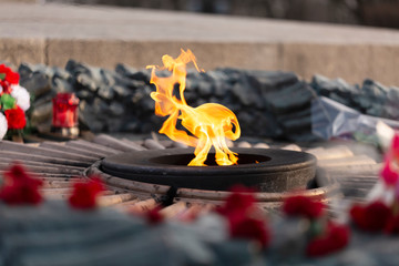 flame of the eternal flame at the memorial monument to warriors heroes. Veterans Day. Victory Day.