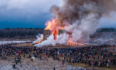 A sculpture of a bridge is burning at the Maslenitsa (Shrovetide) festival at the Nikola-Lenivets art park about 200 kilometers (125 miles) south-west of Moscow, Russia on 29 Feb 2020