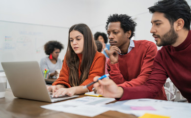 Creative designers working in a project together.