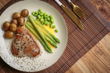 Grilled tuna steak served with asparagus