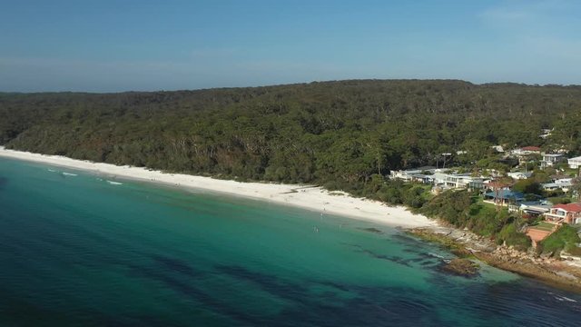 Aerial view of the town of Huskisson along the beautiful waters of Hyams Beach known for its vibrant white sand, at Jervis Bay on the New South Wales South Coast, Australia, on a sunny day 