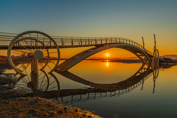 Siheung tidal flat ecological park bicycle bridge sunrise