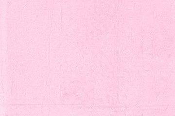 Fototapeta premium Surface of pink stucco wall with scratch and stain background. Pink pastel painted cement wall texture