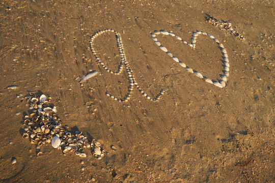 Image drawing in the sand.
