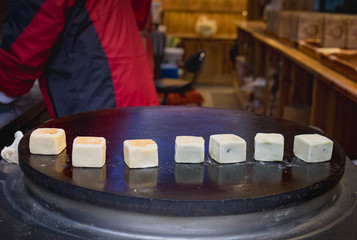 Chinese food - steamed bun or steamed bread put on the hot pan with the taro and red bean.