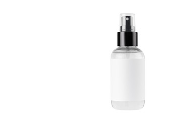 Transparent spray bottle for cosmetics product with white blank label isolated on white background,...