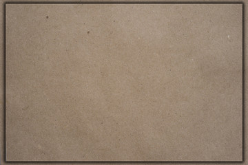 Kraft paper frame texture with the smallest detail and shadow. Recycled plain clean eco friendly craft handmade gray natural material suitable for business presentations background.
