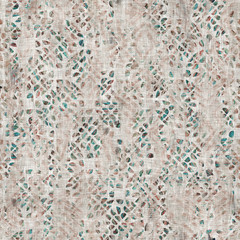 Seamless mixed media collage design in old aged worn look. Intricate geometric design overlaid, mottled, and distressed on fabric texture. Seamless repeat raster jpg pattern swatch.
