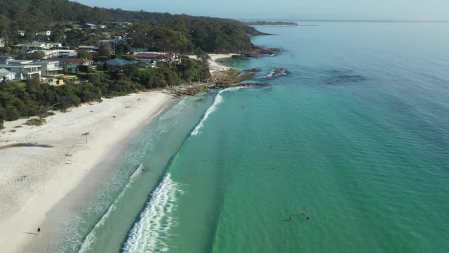 Aerial view of the town of Huskisson along the beautiful waters of Hyams Beach known for its vibrant white sand, at Jervis Bay on the New South Wales South Coast, Australia, on a sunny day 