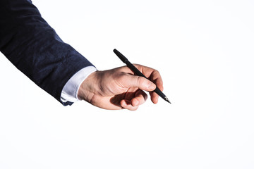 Man hand with pen isolated on white background, business and education concept. Close up