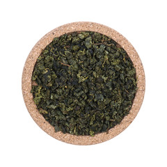 Loose tea Isolated on a white background. On coasters made of cork. Assortment concept for a tea shop, teahouse. Tea collection.