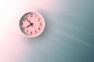Mechanical clock on a light background. Dawn, stylized rays of light. Wake-up time. Space for text....
