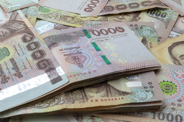 Close up Wallpaper of 1000 Baht banknotes. shopping payment, Financial savings, and money wealth concepts.
