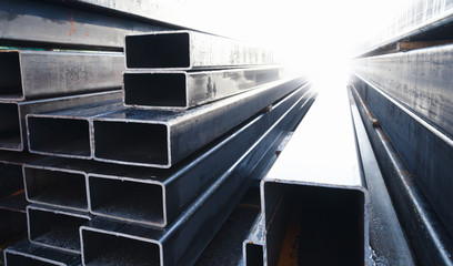 Stack of rolled metal products is in a storage