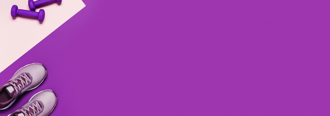 Sports equipment and shoes for women's training. Pink-purple background, diagonal composition.