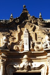 Copy of the Giralda tower above the doorway of the aristocratic palace, Cilla del Cabildo de la Catedral de Sevilla, Osuna, Spain.