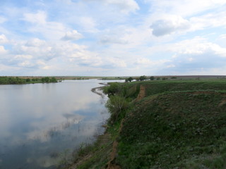 Landscape with lake and clouds