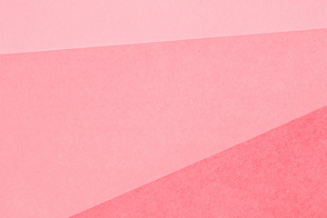 Paper background in coral tones.