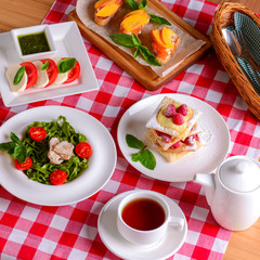 Italian cuisine. Different traditional Italian dishes and desserts on table.