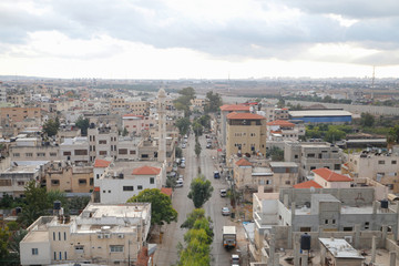 Obraz premium Palestinian city, Qalqilya, West Bank . Many Arabic houses and buildings, overpopulation