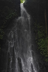 waterfall in the middle of the forest. waterfall flow. Beautiful natural waterfall