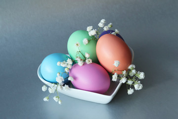 Obraz premium april, background, beautiful, blue, bouquet, breakfast, bright, celebration, close up, colored, colorful, decorated, design, easter, easter eggs, easter flowers, eggs, event, faith, floral, flower, fo