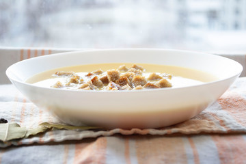 rabbit puree soup with crackers.