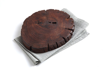 Empty wooden tray and napkin isolated on white background