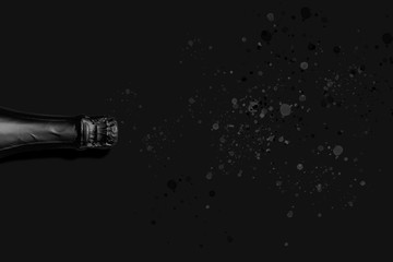 black champagne with color spatter on black background © World of AI