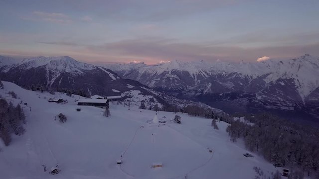Beautiful Scenery Of Snowy Thyon Ski Resort In Vex, Switzerland During Sunrise - Aerial Shot