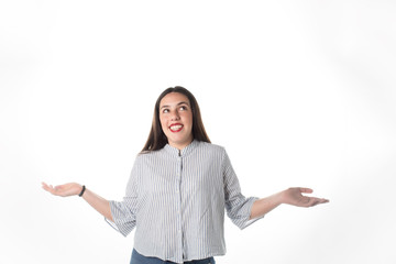 Waist-up shot of amused happy european girl lifting head pointing and looking up mesmerized with fascinated and delighted