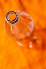 plastic bottle, orange background