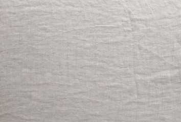 Pure washed linen cloth background. Natural washed linen fabric..