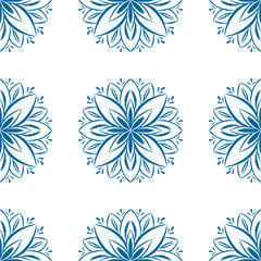 Blue mandala seamless pattern design. Doodle flower illustration.