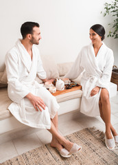 Man and woman, couple, spending a weekend at a spa and enjoying wellness realx. Resort and spa salon