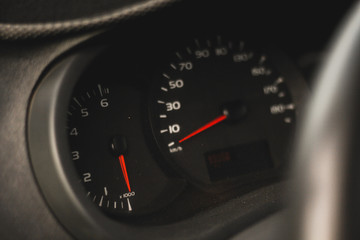 Fototapeta premium speedometer on black background