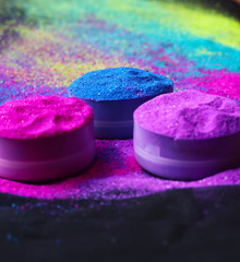 Bright colours for Indian holi festival. Colorful gulal (powder colors) for Happy Holi with copy space.