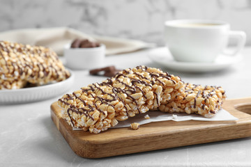 Delicious rice crispy treats on grey table