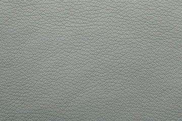 Texture of grey leather as background, closeup
