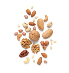 Different delicious nuts on white background, flat lay