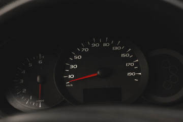 speedometer on black background