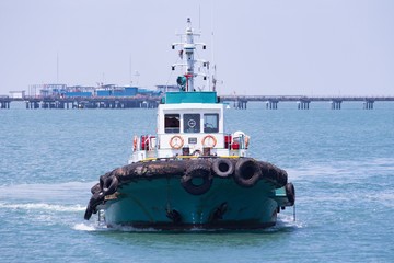 Tugs, barges and container cranes