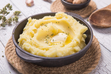 Fresh homemade creamy mashed potato in bowl (Selective Focus, Focus on the tip in the potato puree)