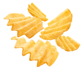 Fluted potato chips levitate on a white background