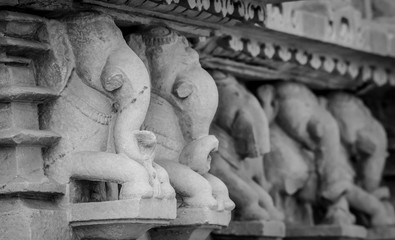 Stone carved erotic bas relief in Hindu temple in Khajuraho, India