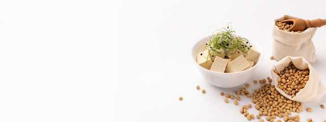 Tofu cubes in bowl and Microgreens on right