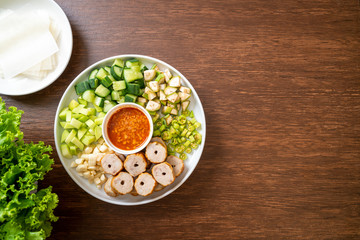 Vietnamese pork  meatball with vegetables wraps (Nam-Neaung or Nham Due)