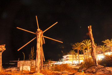 Night view of boats pulled ashore in a port of a fishing village in Formentera in the Balearic...
