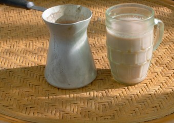  a cup of coffee and a turk are standing on the table